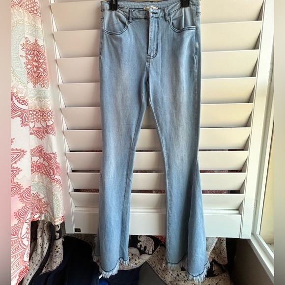 Light washed flair jeans. Super cute just little too long - Picture 2 of 2